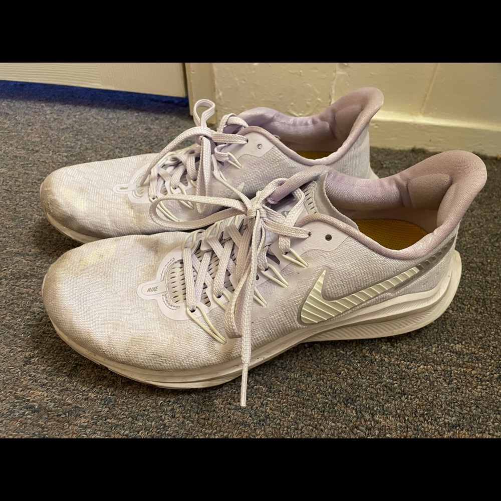 Purple Nike running shoes